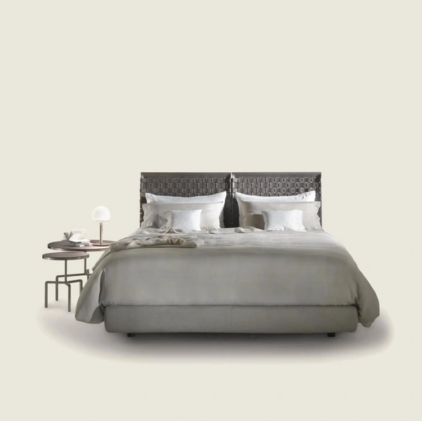 Letto con testiera in cuoio intrecciato Cestone di Flexform