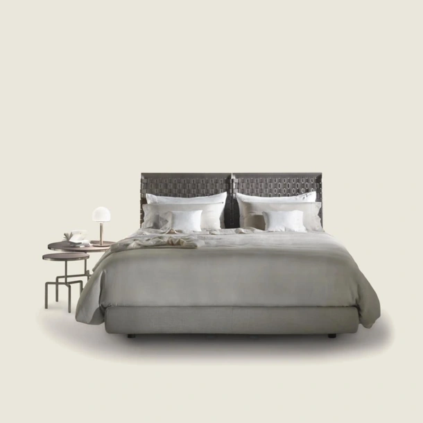 Letto con testiera in cuoio intrecciato Cestone di Flexform