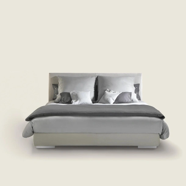 Letto Magnum in tessuto imbottito di Flexform