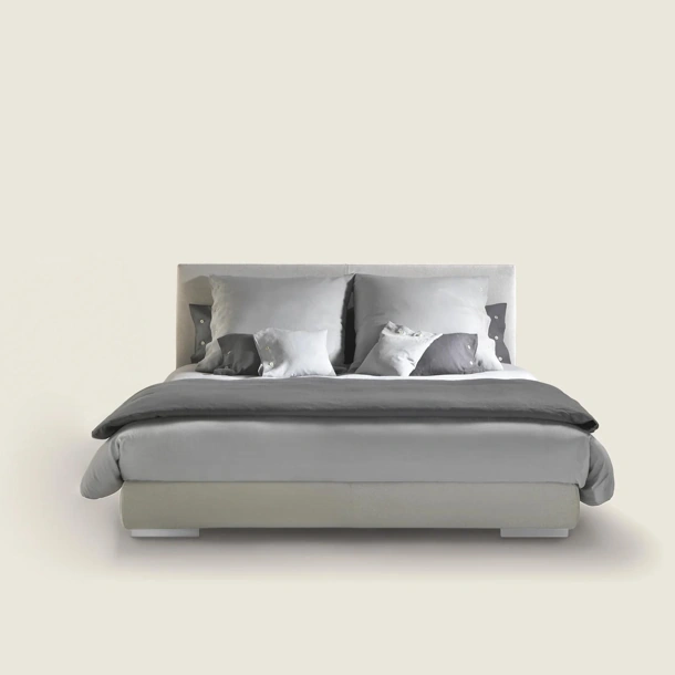 Letto Magnum in tessuto imbottito di Flexform
