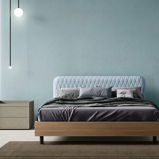 Letto Wing con testiera in tessuto trapuntato di Zalf