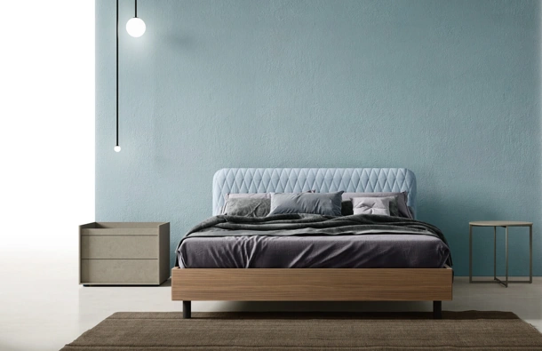 Letto Wing con testiera in tessuto trapuntato di Zalf
