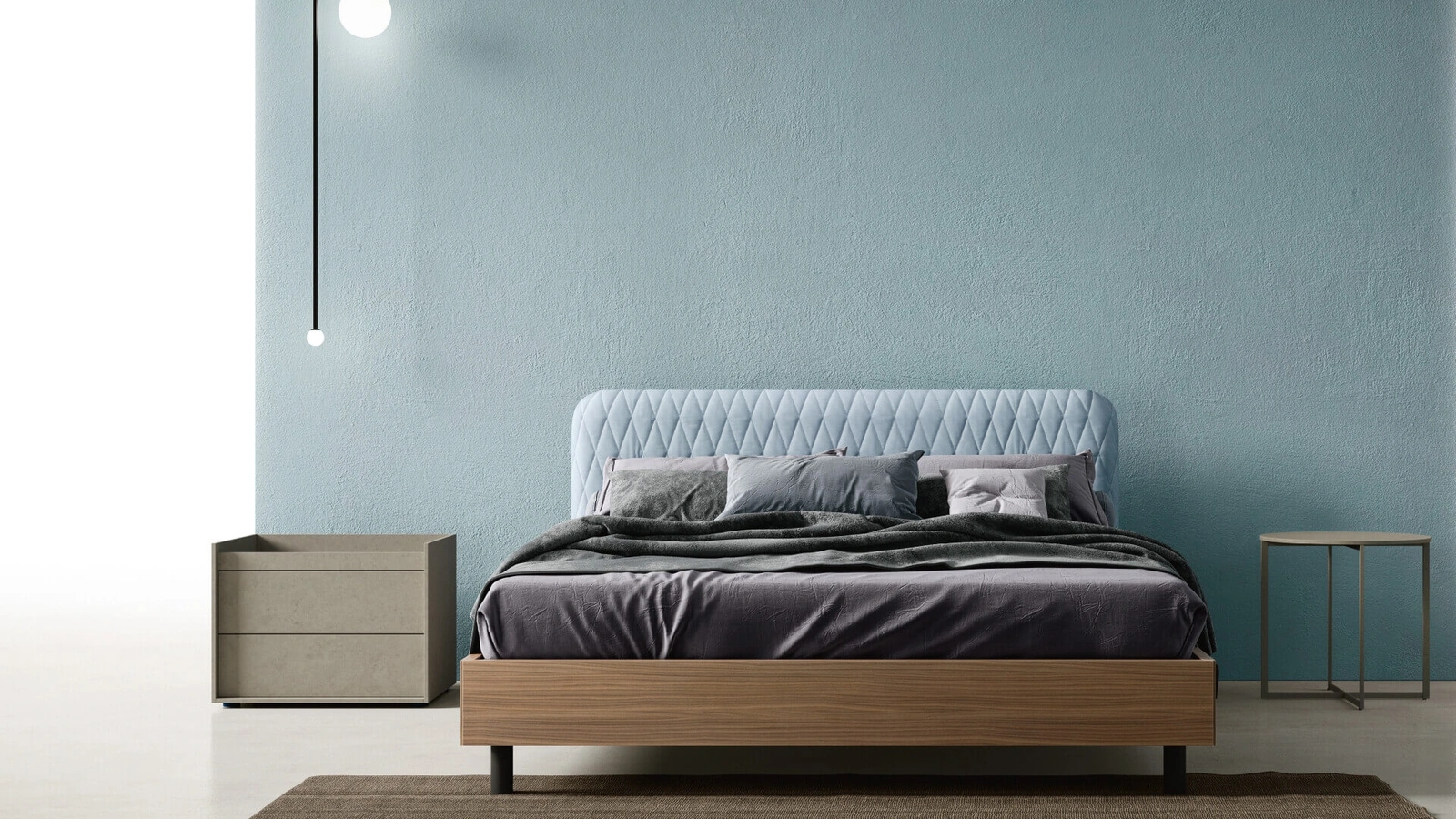 Letto Wing con testiera in tessuto trapuntato di Zalf