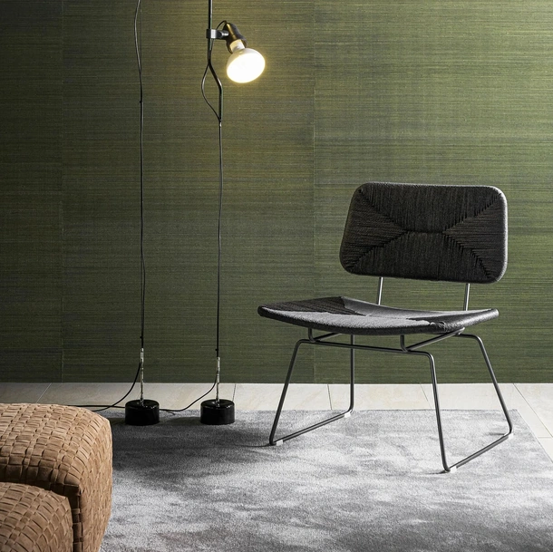 Poltroncina in metallo con schienale e seduta in cordoncino intrecciato Echoes di Flexform