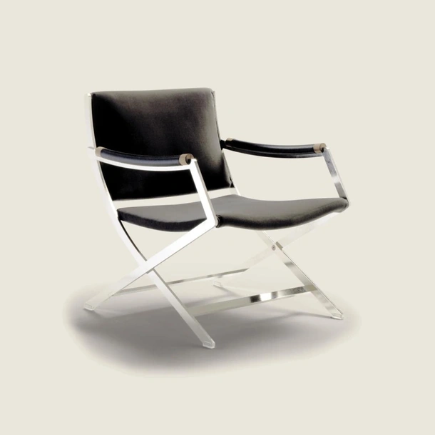 Poltroncina in tessuto e metallo Paul di Flexform