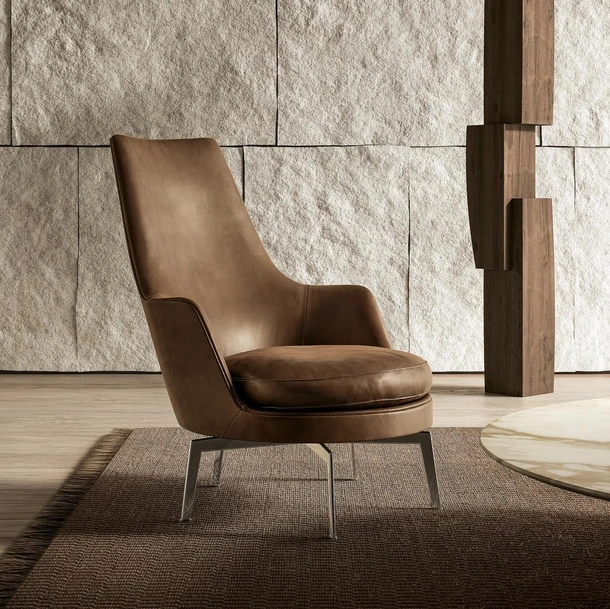 Poltrona in pelle imbottita Guscioalto di Flexform