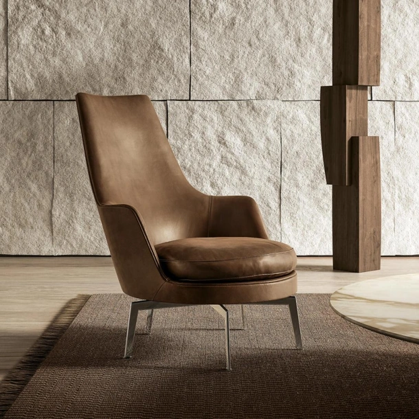 Poltrona in pelle imbottita Guscioalto di Flexform