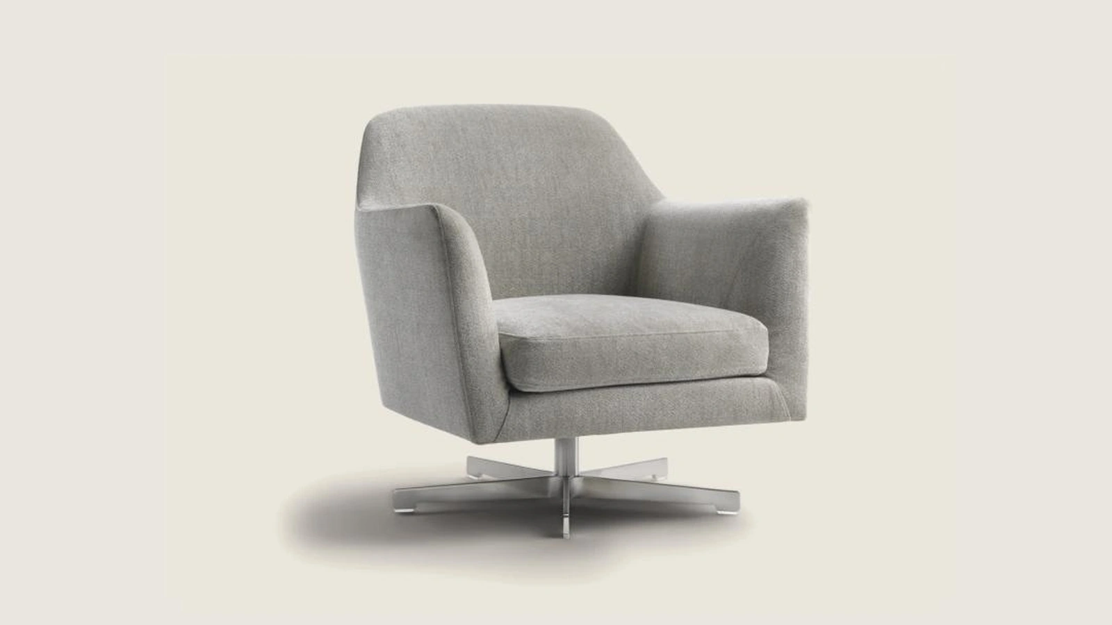 Poltroncina Luce in tessuto con base girevole in metallo di Flexform