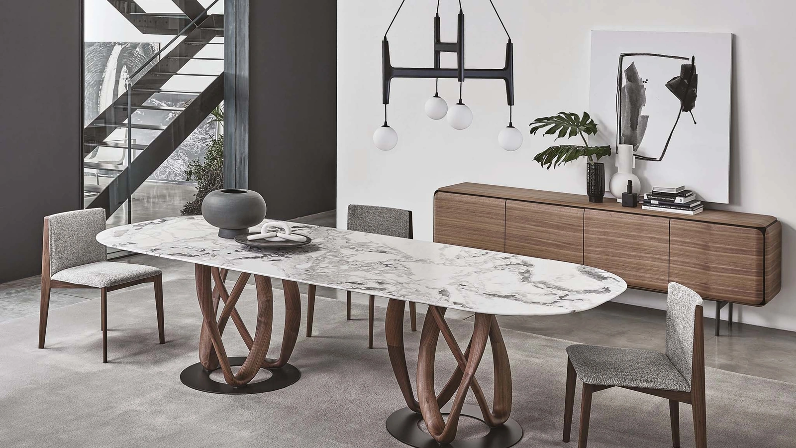 Tavolo ovale con piano in marmo e base in legno massello Infinity di Porada