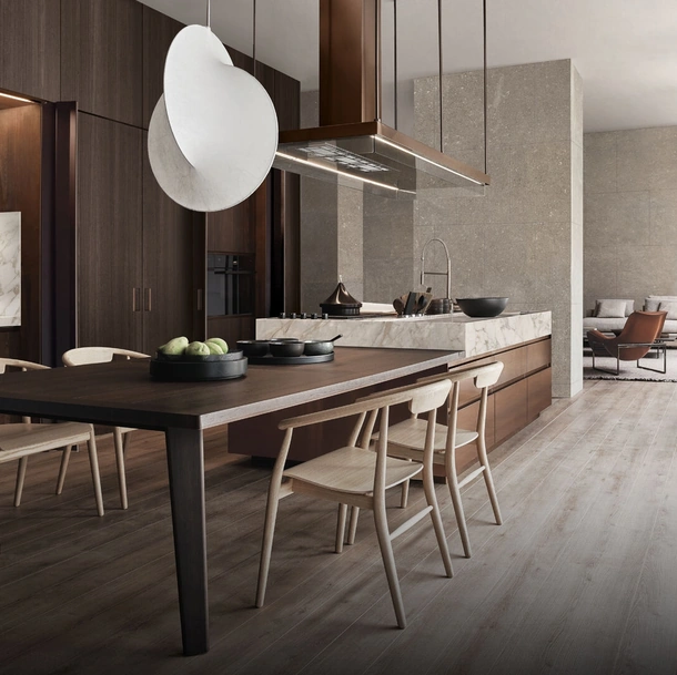 Cucina Design in legno, acciaio e marmo Convivium con tavolo integrato di Arclinea