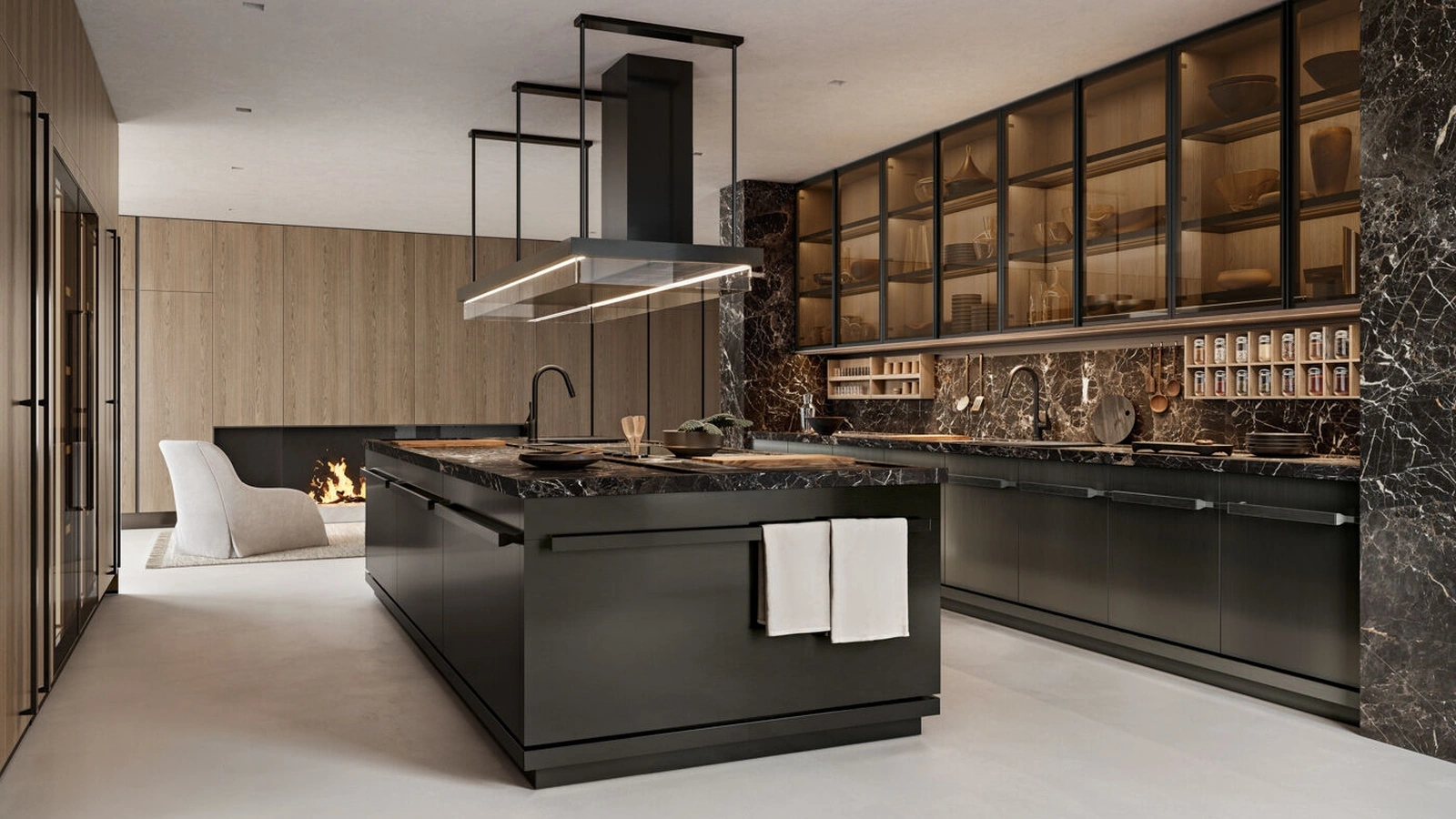 Cucina Design con isola Proxima in acciaio inox con top e schienale in marmo di Arclinea