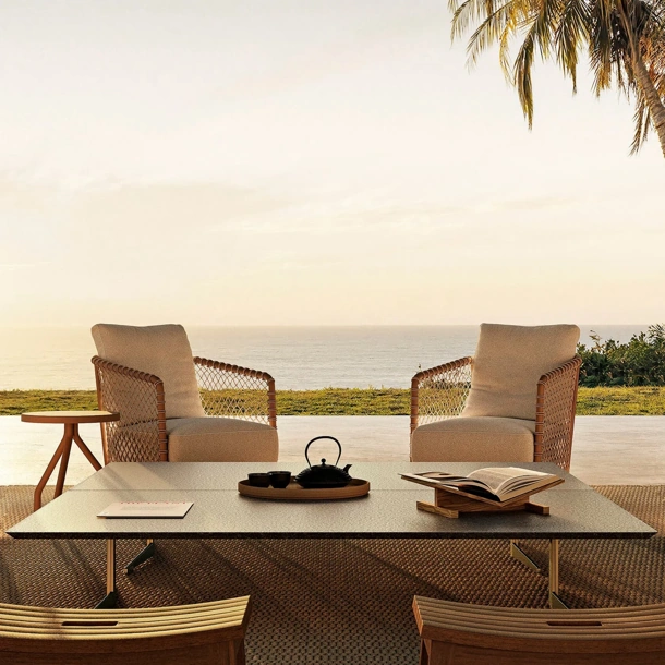 Poltroncina Oasis in metallo e corda intrecciata di Flexform